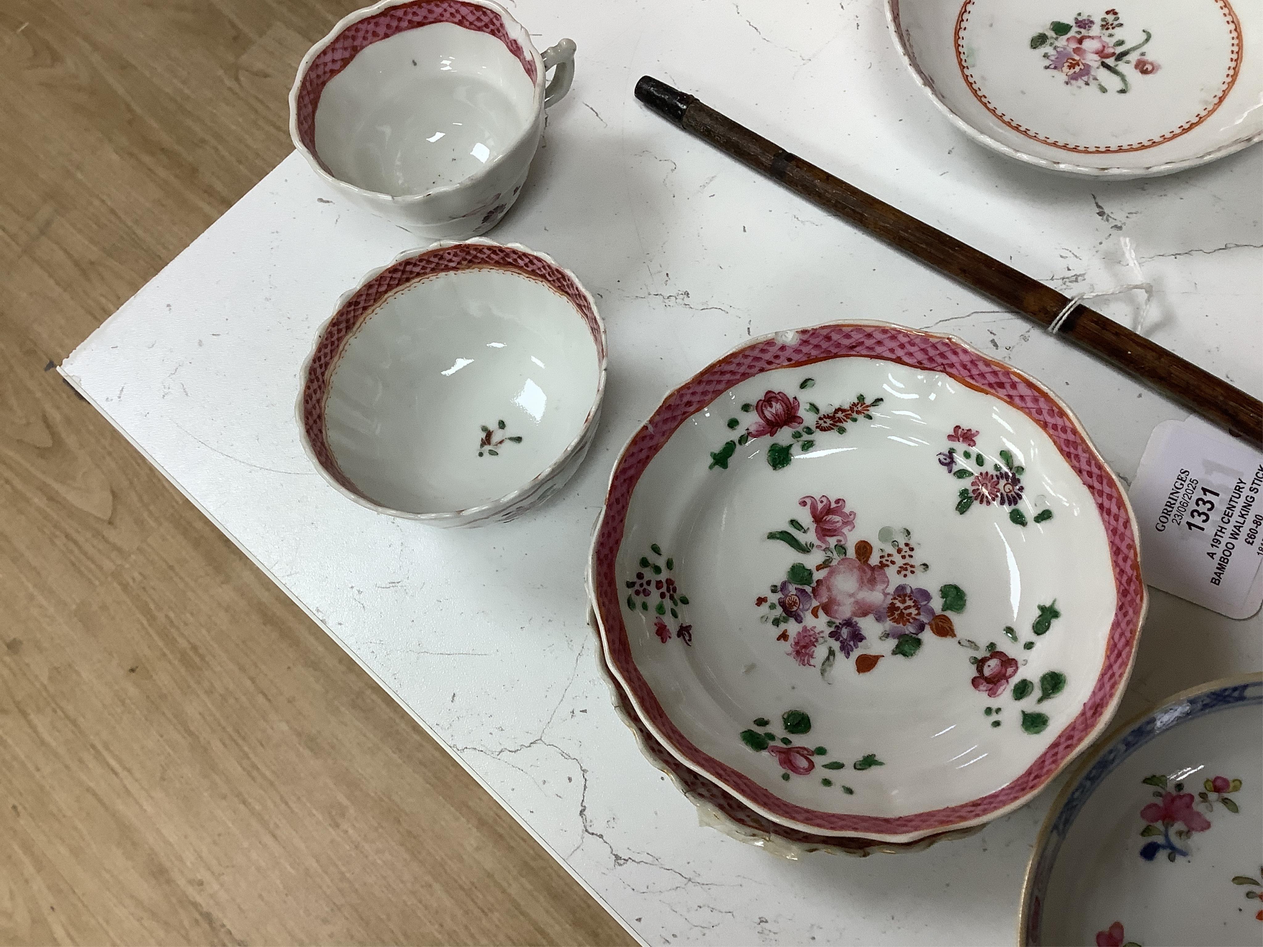 A collection of 18th century Chinese export and English porcelain to include tea bowls and saucers, largest saucer 14cm in diameter